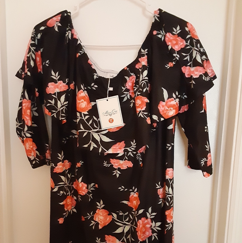 Maternity black dress with flowers.